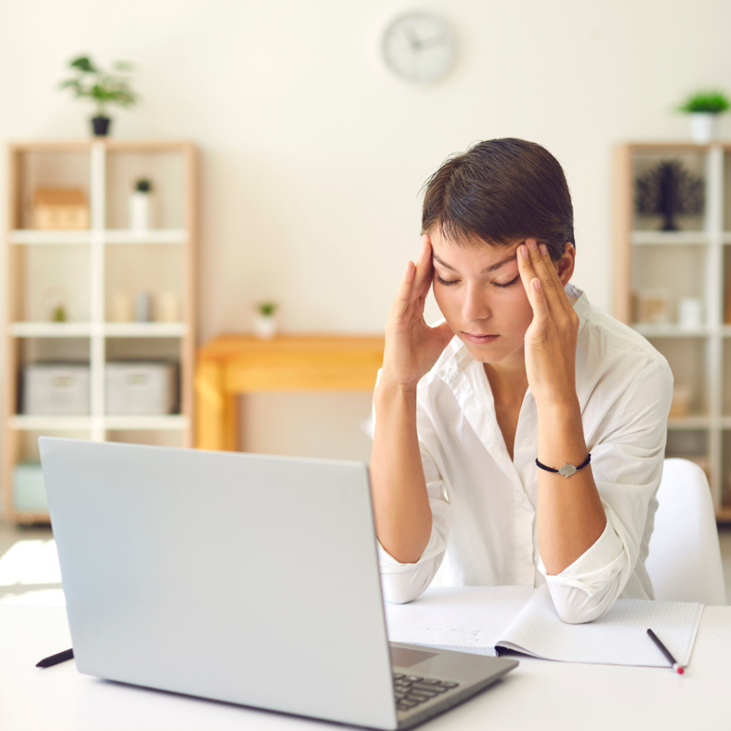 Woman looking stressed from busy work with no strategy