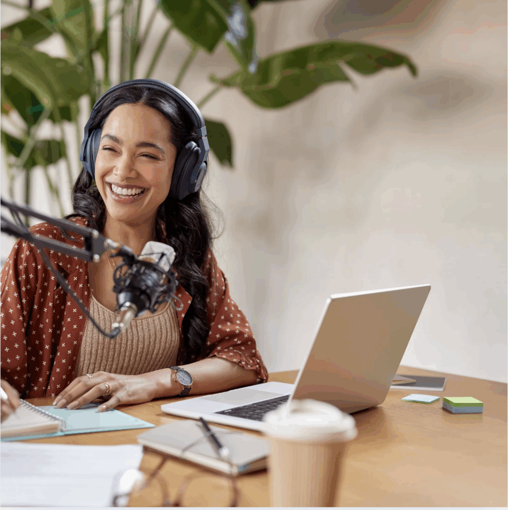Confident woman speaking with a podcast mic in front of her